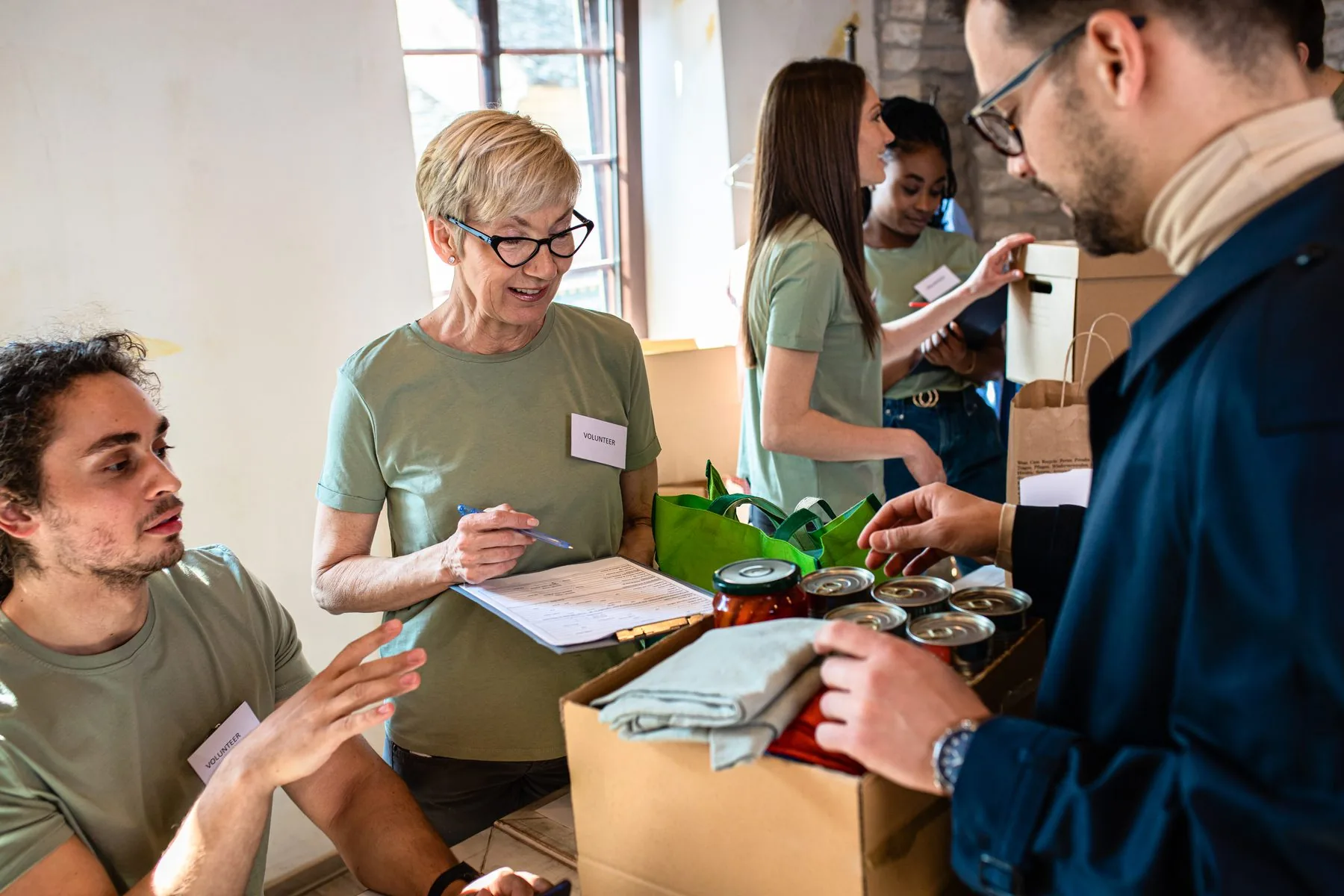 A community work day handing out support